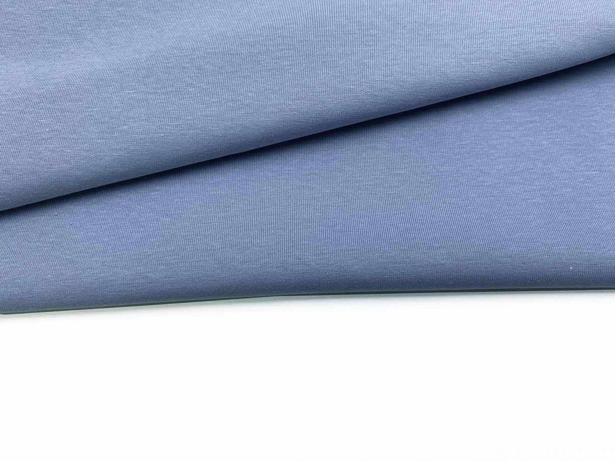 Ткань Интерлок  серо-голубого цвета  однотонная  дубль 38285 4